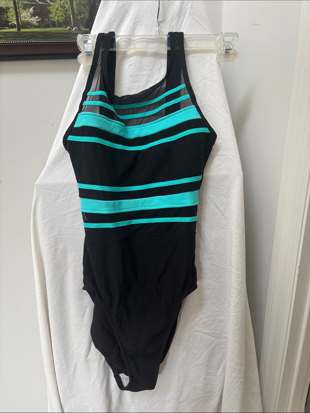 Women
Black One-Piece Swimsuit with Teal Stripes